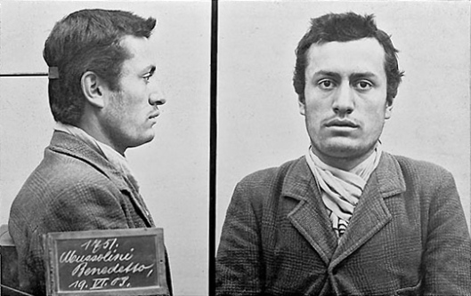Mug shot of the later Italian Fascist leader Benito Mussolini, following his arrest by Swiss police for lack of identification papers.  Date 19 June 1903.jpg